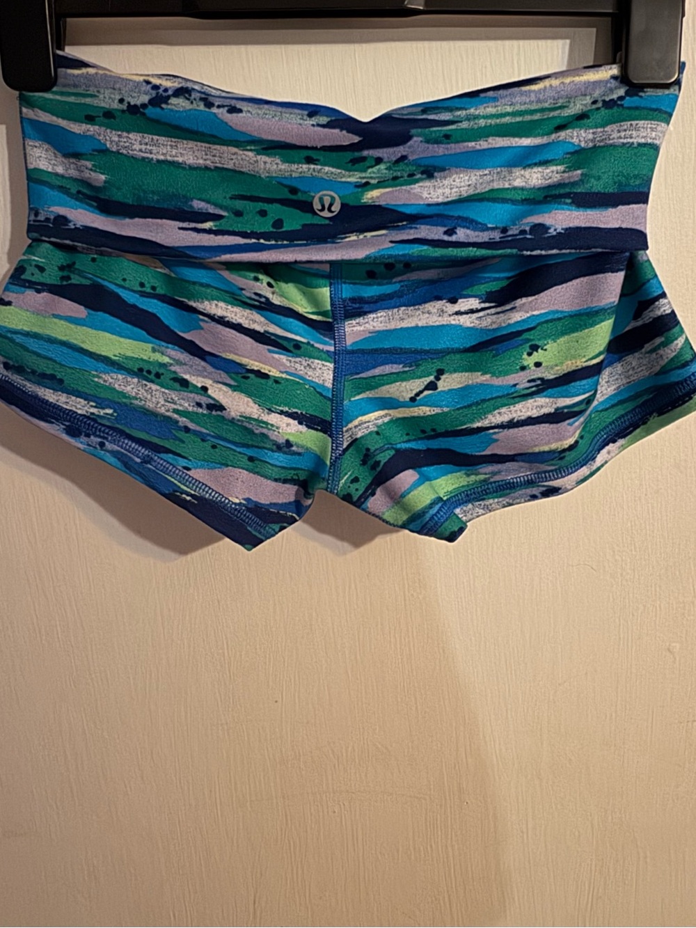 Lululemon Boogie Short Roll Down in rare "Seven Wonders Multi" print.